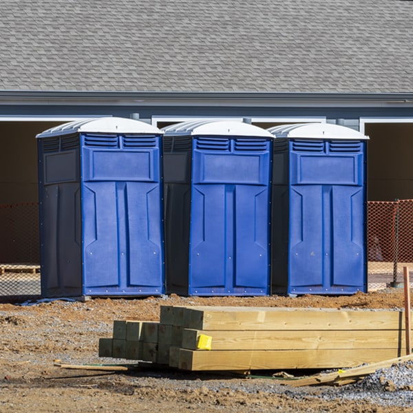 what is the cost difference between standard and deluxe portable toilet rentals in Tsaile AZ